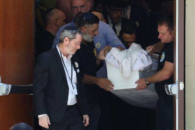 Mourners carry out the coffin of 10-year-old Matilda, who was killed in the December 14 Bondi Beach shooting attack, after the funeral service in Sydney on December 18, 2025. The attack at Bondi Beach on December 14 was one of the deadliest in Australian history. (Photo by DAVID GRAY / AFP)