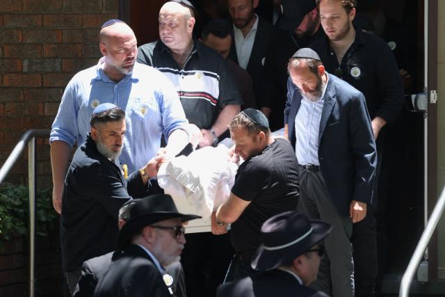 Mourners carry out the coffin of 10-year-old Matilda, who was killed in the December 14 Bondi Beach shooting attack, after the funeral service in Sydney on December 18, 2025. The attack at Bondi Beach on December 14 was one of the deadliest in Australian history. (Photo by DAVID GRAY / AFP)