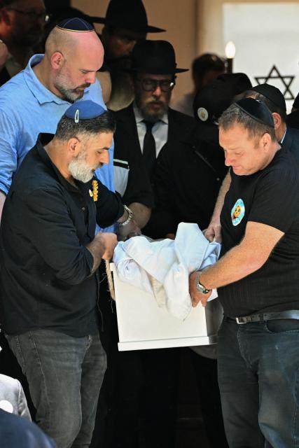 Mourners carry out the coffin of 10-year-old Matilda, who was killed in the December 14 Bondi Beach shooting attack, after the funeral service in Sydney on December 18, 2025. The attack at Bondi Beach on December 14 was one of the deadliest in Australian history. (Photo by Saeed KHAN / AFP)