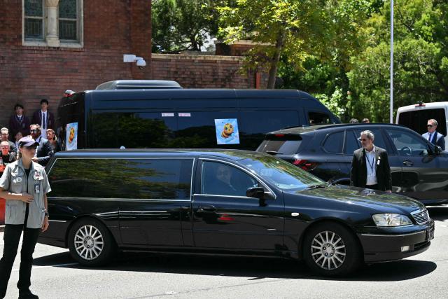 The hearse with the coffin of 10-year-old Matilda, who was killed in the December 14 Bondi Beach shooting attack, leaves after her funeral service in Sydney on December 18, 2025. Australia's Prime Minister Anthony Albanese promised a sweeping crackdown on "hate, division and radicalisation" on December 18 after a mass shooting killed 15 people at a Jewish festival on Bondi Beach. (Photo by Saeed KHAN / AFP)