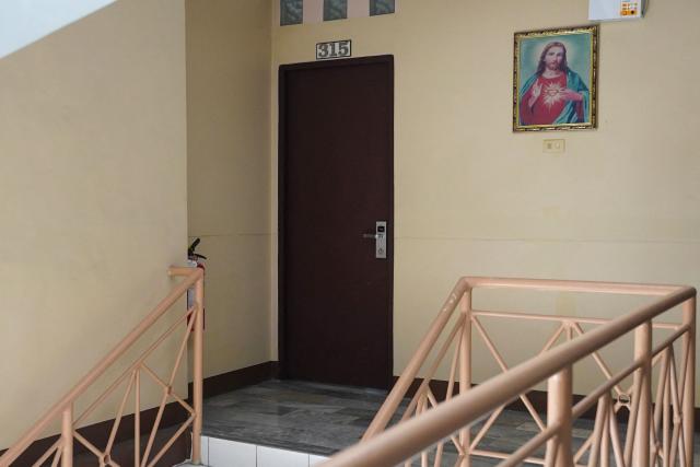 This photo taken on December 18, 2025 shows the door to the room at GV Hotel in Davao City, on the Philippines' southern island of Mindanao, where father-and-son duo Sajid and Naveed Akram stayed during their visit in November, before they allegedly killed 15 people on Bondi Beach in Australia. Australian police are investigating whether the pair met with Islamist extremists during a visit to the Philippines weeks before the shooting. (Photo by Ferdinandh CABRERA / AFP)