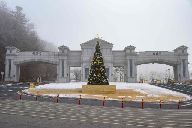 This photo shows a general view of the entrance to the Cheon Jeong Gung, the Unification Church leader Han Hak-ja's residence in Gapyeong on December 18, 2025. (Photo by Shin Yong-ju / AFP)