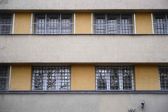 (FILES) Exterior view shows barred security windows on the building  of the "Budapest reformatory detention centre" in the third district of Budapest on December 10, 2025. With four months to go until key Hungarian elections, mounting public outrage over perceived inaction on child abuse allegations in state-run institutions is shrinking Prime Minister Viktor Orban's chances to hold onto power. That scandal has shaken the nationalist leader's tight grip on power and helped fuel the rise of Hungarian opposition leader Peter Magyar, a former government insider. (Photo by ATTILA KISBENEDEK / AFP)