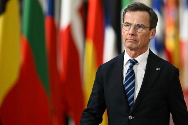 Sweden's Prime Minister Ulf Kristersson arrives to attend the European Council meeting in Brussels on December 18, 2025. European Unions leaders meet in Brussels on December 18 and 19, 2025, to discuss in particular the need to support Ukraine, transatlantic relations and the EU's strategic autonomy. (Photo by NICOLAS TUCAT / AFP)