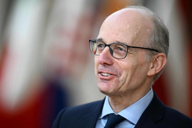 Luxembourg's Prime Minister Luc Frieden reacts as he arrives to attend the European Council meeting in Brussels on December 18, 2025. European Unions leaders meet in Brussels on December 18 and 19, 2025, to discuss in particular the need to support Ukraine, transatlantic relations and the EU's strategic autonomy. (Photo by NICOLAS TUCAT / AFP)