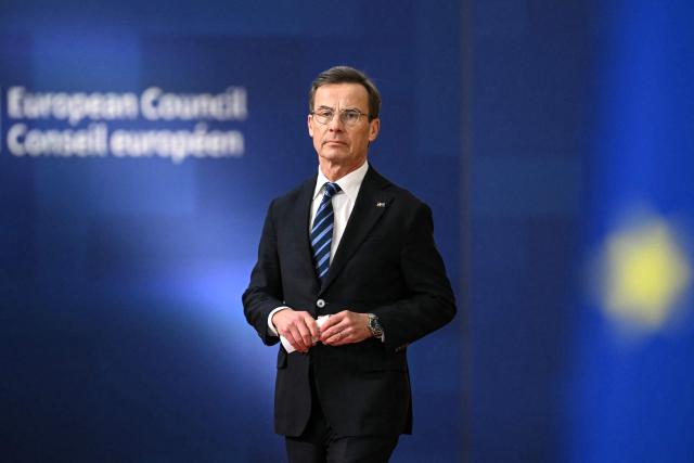 Sweden's Prime Minister Ulf Kristersson arrives to attend the European Council meeting in Brussels on December 18, 2025. European Unions leaders meet in Brussels on December 18 and 19, 2025, to discuss in particular the need to support Ukraine, transatlantic relations and the EU's strategic autonomy. (Photo by NICOLAS TUCAT / AFP)