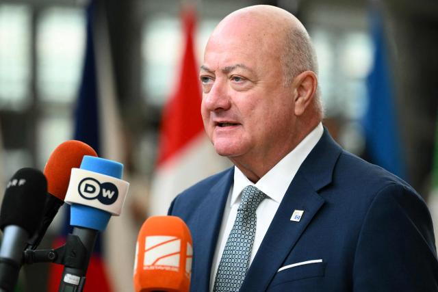 Austria's Chancellor Christian Stocker speaks to the press as he arrives to attend the European Council meeting in Brussels on December 18, 2025. European Unions leaders meet in Brussels on December 18 and 19, 2025, to discuss in particular the need to support Ukraine, transatlantic relations and the EU's strategic autonomy. (Photo by NICOLAS TUCAT / AFP)