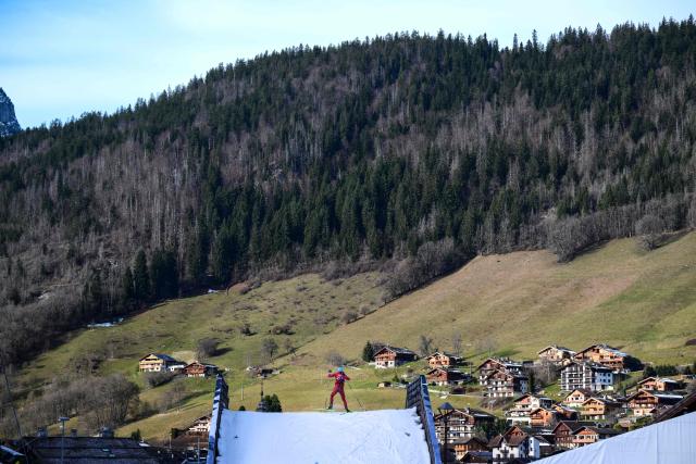 Biathletes practice during the IBU Biathlon World Cup in Le Grand Bornand near Annecy, central-eastern France, on December 18, 2025. (Photo by OLIVIER CHASSIGNOLE / AFP)