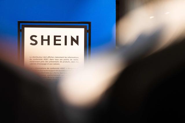 (FILES) This photograph shows the logo of Asian e-commerce giant Shein in its stall at the Bazar de l'Hotel de Ville (BHV) department store in Paris on November 4, 2025. French justice will rule on December 19 on the French government’s request for a three-month suspension of the platform of Asian online retail giant Shein, due to the illicit products it was selling, a Paris court decided on December 5. (Photo by Julie SEBADELHA / AFP)