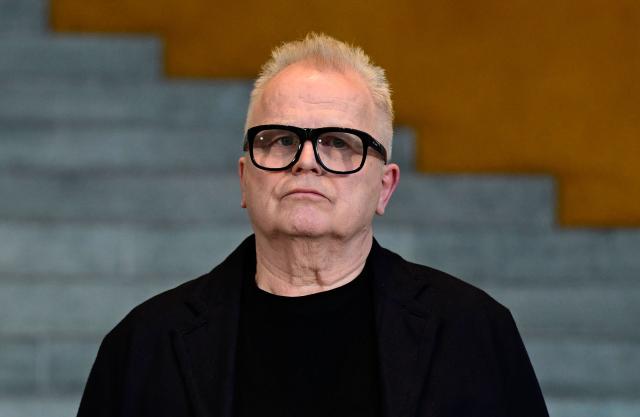 German musician Herbert Groenemeyer gives a statement following a meeting with the German State Minister for Culture (not in picture) to discuss the effects of music streaming at the Chancellery in Berlin on December 18, 2025. (Photo by John MACDOUGALL / AFP)