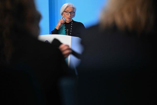 European Central Bank (ECB) President Christine Lagarde addresses a press conference on the Eurozone's monetary policy, at the central bank's headquarters in Frankfurt am Main, western Germany, on December 18, 2025. The European Central Bank held its key interest rate steady on December 18, 2025 for a fourth straight meeting and said it expected inflation to stabilise around its two-percent target "in the medium term". (Photo by Kirill KUDRYAVTSEV / AFP)