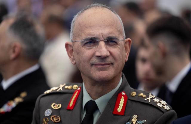 Greece's Chief of the Hellenic National defence General Dimitrios Choupis looks on during the delivery ceremony of the Defence and Intervention frigate HS Kimon to the Greek Navy in Lorient, western France on December 18, 2025. (Photo by Fred TANNEAU / AFP)