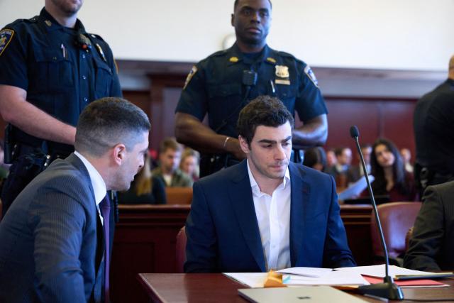 Luigi Mangione (R) confers with his attorney, Jacob Kaplan, as he appears in Manhattan Supreme Court during an evidence suppression hearing in the murder case of United Healthcare CEO Brian Thompson, in New York, on December 18, 2025. (Photo by Curtis Means / POOL / AFP)