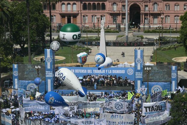This view shows a protest organized by Argentine unions at Plaza de Mayo in Buenos Aires on December 18, 2025. People protested on December 18, against the labor reform promoted by Argentina’s ultraliberal President Javier Milei, in a demonstration called by the country’s main labor union. It was the first protest against the initiative, held outside the government palace in Buenos Aires. (Photo by Juan Mabromata / AFP)