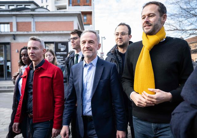 French communist party (PCF) senator Ian Brossat (L), Socialistes et Apparentes' MP Emmanuel Gregoire (C) and Deputy mayor of Paris on Public Space, Transport and Mobility of the Europe Ecologie Les Verts (EELV) French ecologists' Party David Belliard (R) prepare to deliver remarks to journalists before their meeting in Paris, on December 18, 2025. The Socialist MP concluded on December 18, 2025, a historic first round left-wing alliance  for the March 2026 municipal elections with ecologist party's David Belliard, and communist party's Ian Brossat, but without Jean-Luc Melenchons LFI party. (Photo by BERTRAND GUAY / AFP)