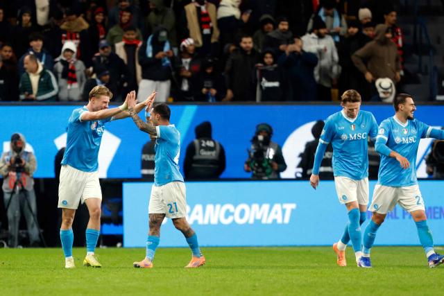 SCC Napoli players celebrate scoring the second goal during the Italian Super Cup semi-final match between SCC Napoli and AC Milan at King Saud University Stadium in Riyadh on December 18, 2025. (Photo by Fayez Nureldine / AFP)