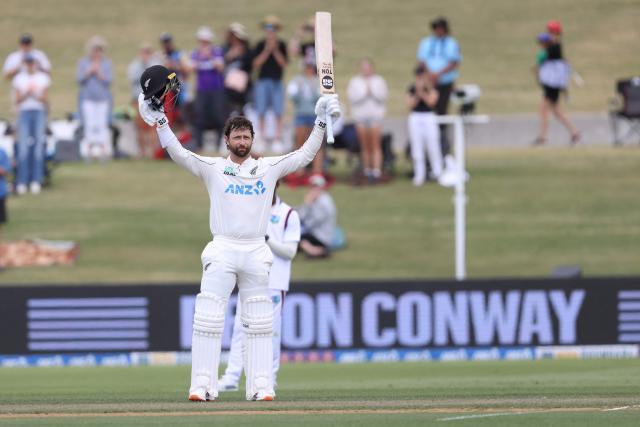 New Zealand’s Devon Conway celebrates his double century during day two of the 3rd international Test cricket match between New Zealand and West Indies at Bay Oval in Mount Maunganui on December 19, 2025. (Photo by Michael Bradley / AFP)
