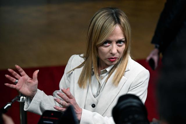 Italy's Prime Minister Giorgia Meloni speaks during a press conference at the end of the European Council meeting in Brussels, Belgium, on December 19, 2025. (Photo by Nicolas TUCAT / AFP)