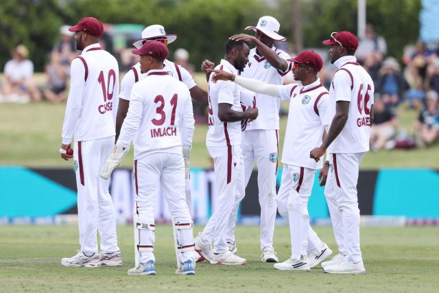 West Indies Anderson Phillip celebrates the wicket of New Zealand’s Glenn Phillips during day two of the 3rd international Test cricket match between New Zealand and West Indies at Bay Oval in Mount Maunganui on December 19, 2025. (Photo by Michael Bradley / AFP)