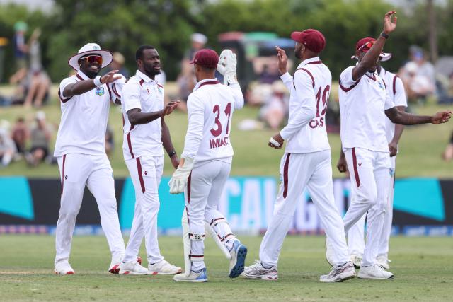 West Indies' Anderson Phillip celebrates the wicket of New Zealand’s Glenn Phillips during day two of the 3rd international Test cricket match between New Zealand and West Indies at Bay Oval in Mount Maunganui on December 19, 2025. (Photo by Michael Bradley / AFP)