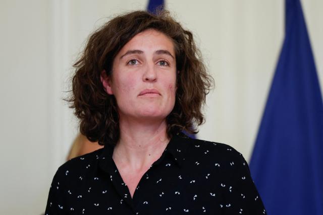 (FILES) French former tennis player Angelique Cauchy delivers remarks during the presentation of the finalized report to the French government dubbed "Rapport sur les violences sexistes et sexuelle sous relation d'autorite ou de pouvoir" (Report on sexist and sexual violence committed within a relationship of authority or power), at the State Secretariat in charge of gender equality and against discrimination, in Paris, on November 18, 2024. A victim of repeated rapes by her coach during her adolescence, former tennis player Angélique Cauchy has turned her trauma into a fight against violence against children in sports, through the Rebond association, which conducts training sessions across the country. (Photo by Ian LANGSDON / AFP)