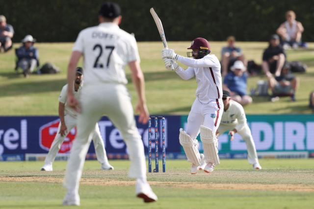 West Indies' John Campbell (R) bats during day two of the third international Test cricket match between New Zealand and West Indies at Bay Oval in Mount Maunganui on December 19, 2025. (Photo by Michael Bradley / AFP)