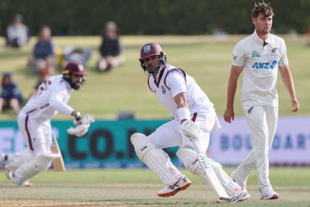 West Indies' Brandon King (C) makes a run during day two of the third international Test cricket match between New Zealand and West Indies at Bay Oval in Mount Maunganui on December 19, 2025. (Photo by Michael Bradley / AFP)