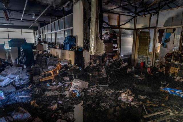 A general view shows the burned-out interior of The Daily Star newspaper office in Dhaka on December 19, 2025, amid protests following the news of the death of youth leader Sharif Osman Hadi. Violence broke out in Bangladesh's capital early on December 19 after a youth leader of the country's 2024 pro-democracy uprising who was injured in an assassination attempt died in a hospital in Singapore. Several buildings in the capital, including those housing the country's two leading newspapers, were set on fire, according to authorities, with staff trapped inside. (Photo by Abdul Goni / AFP)