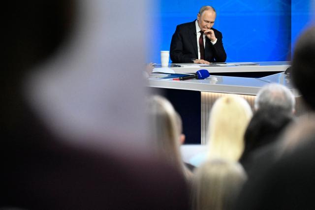 Russian President Vladimir Putin holds his annual end-of-year press conference in Moscow on December 19, 2025. (Photo by Alexander NEMENOV / AFP)