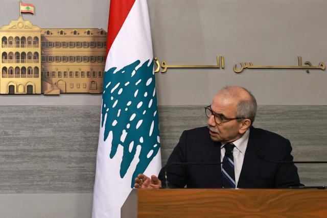 Lebanese Prime Minister Nawaf Salam speaks during a joint press conference with his Egyptian counterpart after their meeting in Beirut on December 19, 2025. (Photo by IBRAHIM AMRO / AFP)