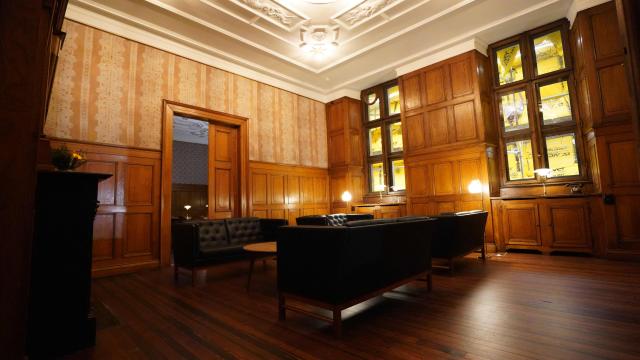 The reopened "Tietgen’s Office" at Copenhagen's Old Stock Exchange "Boersen" building is pictured as reconstruction work is partly finished after the 2024 fire, in Copenhagen, Denmark, on December 18, 2025. Twenty months after a devastating fire, parts of Copenhagen’s 16th-century Old Stock Exchange have reopened to visitors on December 19, 2025. The historic former stock exchange building Boersen was severely damaged by a fire on April 16, 2024. (Photo by James BROOKS / AFP)