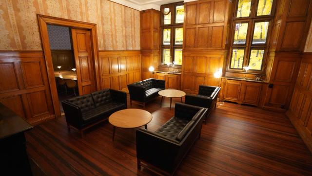 The reopened "Tietgen’s Office" at Copenhagen's Old Stock Exchange "Boersen" building is pictured as reconstruction work is partly finished after the 2024 fire, in Copenhagen, Denmark, on December 18, 2025. Twenty months after a devastating fire, parts of Copenhagen’s 16th-century Old Stock Exchange have reopened to visitors on December 19, 2025. The historic former stock exchange building Boersen was severely damaged by a fire on April 16, 2024. (Photo by James BROOKS / AFP)