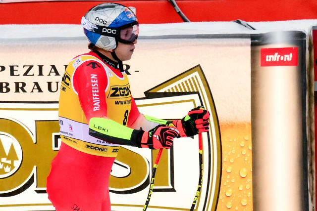 Switzerland's Marco Odermatt reacts crossing the finish line of the men's Super G race during the FIS Alpine Ski World Cup, in Val Gardena, on December 19, 2025. (Photo by Stefano RELLANDINI / AFP)