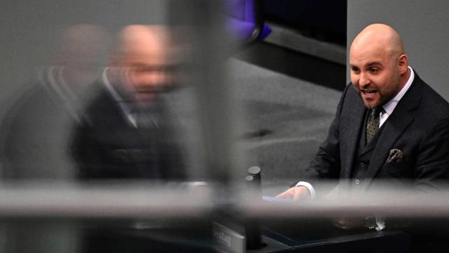 Markus Frohnmaier, parliamentary group vice-leader of the far-right Alternative for Germany (AfD) party, speaks during a debate at the Bundestag (lower house of parliament), on December 19, 2025 in Berlin. (Photo by John MACDOUGALL / AFP)