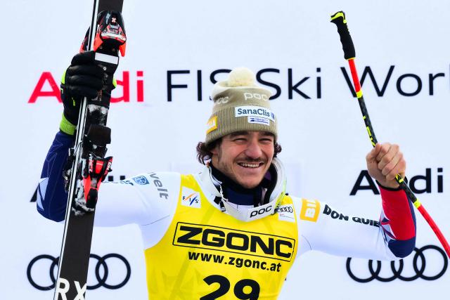 Czech Republic's Jan Zabystran celebrates on the podium after winning the FIS Alpine Skiing men's World Cup Super G in Val Gardena on December 19, 2025. (Photo by Stefano RELLANDINI / AFP)