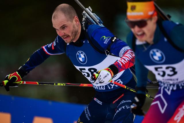 France's Emilien Jacquelin (L) and Moldova's Maksim Makarov (R) compete during the men's 10km sprint event of the IBU Biathlon World Cup, in Le Grand Bornand, near Annecy, southeastern France, on December 19, 2025. (Photo by Olivier CHASSIGNOLE / AFP)