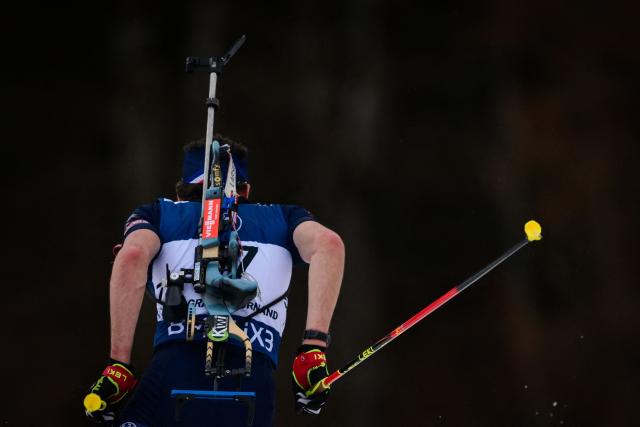 France's Valentin Lejeune competes during the men's 10km sprint event of the IBU Biathlon World Cup, in Le Grand Bornand, near Annecy, southeastern France, on December 19, 2025. (Photo by Olivier CHASSIGNOLE / AFP)