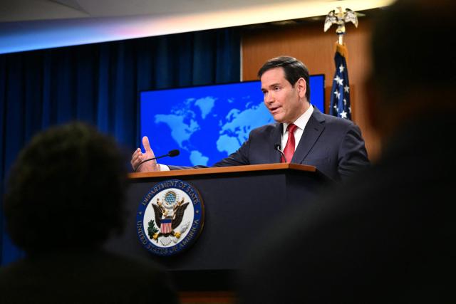 US Secretary of State Marco Rubio gestures as he speaks during an end-of-year press conference in the State Department Press Briefing Room in Washington, DC on December 19, 2025. (Photo by Mandel NGAN / AFP)