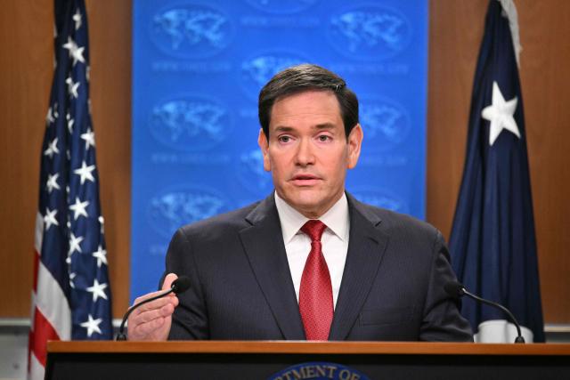 US Secretary of State Marco Rubio gestures as he speaks during an end-of-year press conference in the State Department Press Briefing Room in Washington, DC on December 19, 2025. (Photo by Mandel NGAN / AFP)