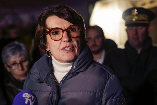 France's Agriculture Minister Annie Genevard delivers remarks to journalists after her visit to a farm in Gambais in the Yvelines outside Paris on December 19, 2025. French farmers have been protesting against the government's mandatory culling protocol for cattle herds affected by lumpy skin disease (dermatose nodulaire contagieuse), a viral disease first detected in France in June 2025 that has led to the slaughter of over 3,000 cattle across more than 110 outbreaks nationwide, which sparked the resurgence of farmers anger fueled by the EU-Mercosur agreement. The signing of the trade deal was pushed back to January on December 18, 2025, after farmers staged a show of force against the pact outside a Brussels leaders' summit. (Photo by Charlotte SIEMON / AFP)