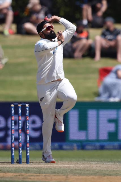 New Zealand's Ajaz Patel bowls during day three of the 3rd international Test cricket match between New Zealand and West Indies at Bay Oval in Mount Maunganui on December 20, 2025. (Photo by Michael Bradley / AFP)
