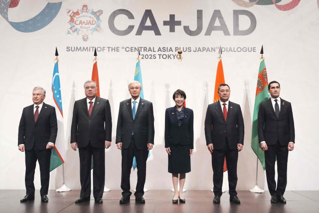 Japan's Prime Minister Sanae Takaichi (3rd R) poses with the leaders of the five Central Asian countries, Uzbekistan's President Shavkat Mirziyoyev (L), Tajikistan's President Emomali Rahmon (2nd L), Kazakhstan's President Kassym-Jomart Tokayev (3rd L), Kyrgyzstan's President Sadyr Japarov (2nd R), and Turkmenistan's President Serdar Berdimuhamedow (R), during a photo session before the Summit of the "Central Asia plus Japan" Dialogue in Tokyo on December 20, 2025. (Photo by Kazuhiro NOGI / POOL / AFP)