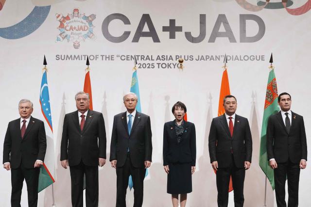 Japan's Prime Minister Sanae Takaichi (3rd R) poses with the leaders of the five Central Asian countries, Uzbekistan's President Shavkat Mirziyoyev (L), Tajikistan's President Emomali Rahmon (2nd L), Kazakhstan's President Kassym-Jomart Tokayev (3rd L), Kyrgyzstan's President Sadyr Japarov (2nd R), and Turkmenistan's President Serdar Berdimuhamedow (R), during a photo session before the Summit of the "Central Asia plus Japan" Dialogue in Tokyo on December 20, 2025. (Photo by Kazuhiro NOGI / POOL / AFP)