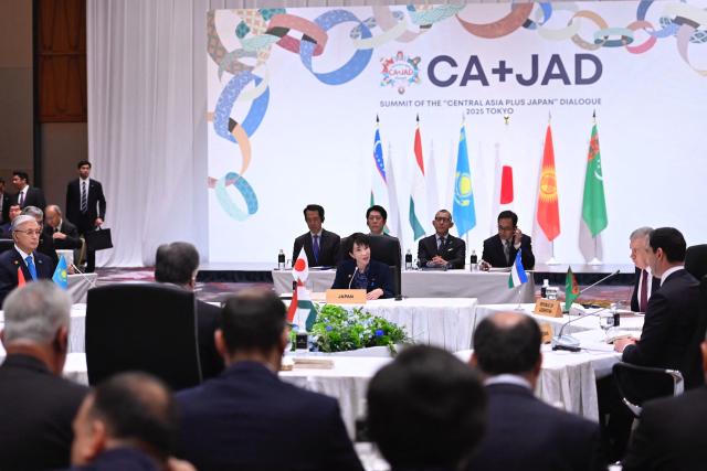 Japan’s Prime Minister Sanae Takaichi (C) delivers welcoming remarks at the leaders-level "Central Asia plus Japan" Dialogue (CA+JAD) Summit in Tokyo on December 20, 2025. (Photo by David MAREUIL / POOL / AFP)