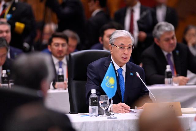 Kazakhstan’s President Kassym-Jomart Tokayev delivers remarks at the leaders-level "Central Asia plus Japan" Dialogue (CA+JAD) Summit in Tokyo on December 20, 2025. (Photo by David MAREUIL / POOL / AFP)