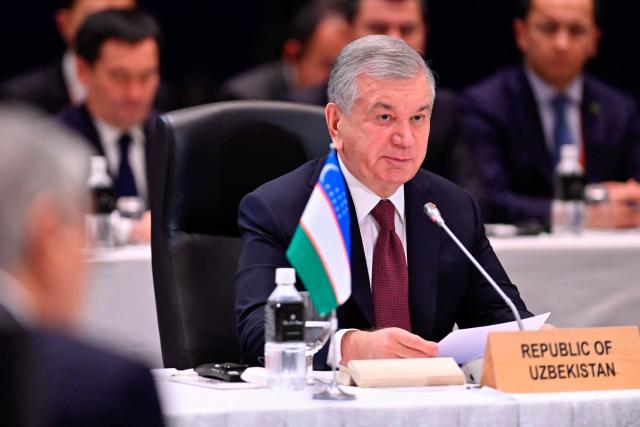 Uzbekistan's President Shavkat Mirziyoyev delivers remarks at the leaders-level "Central Asia plus Japan" Dialogue (CA+JAD) Summit in Tokyo on December 20, 2025. (Photo by David MAREUIL / POOL / AFP)