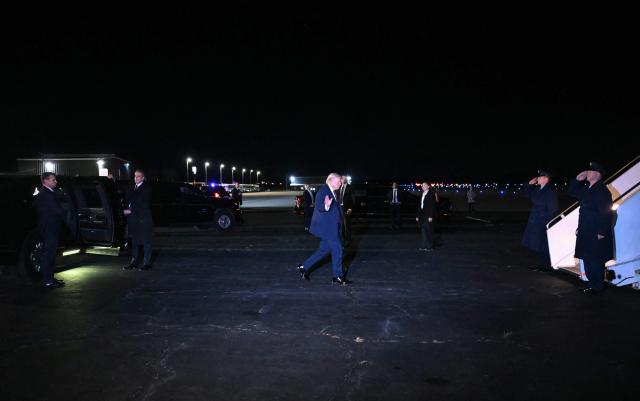 US President Donald Trump walks to board Air Force One as he departs from Rocky Mount Wilson Regional Airport in Elm City, North Carolina, after holding a political rally on December 19, 2025. President Trump is on his way to Florida to spend the weekend at his Mar-a-Lago estate. (Photo by ANDREW CABALLERO-REYNOLDS / AFP)