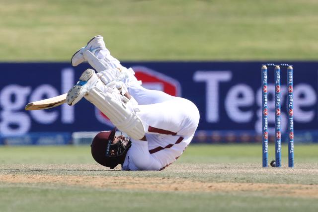 West Indies' Kavem Hodge avoids the bouncer during day three of the 3rd international Test cricket match between New Zealand and West Indies at Bay Oval in Mount Maunganui on December 20, 2025. (Photo by Michael Bradley / AFP)