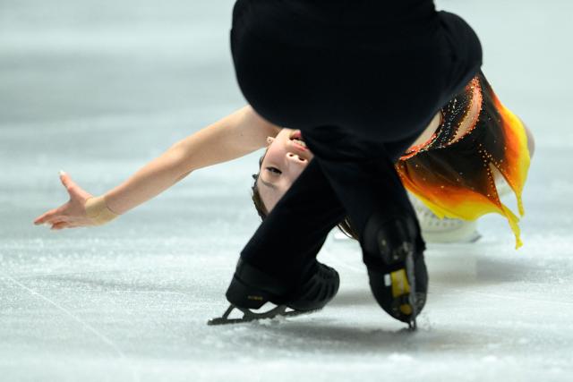 Japan's Yuna Nagaoka and Sumitada Moriguchi compete in the pairs short program during Japan Figure Skating Championships in Tokyo on December 20, 2025. (Photo by Philip FONG / AFP)