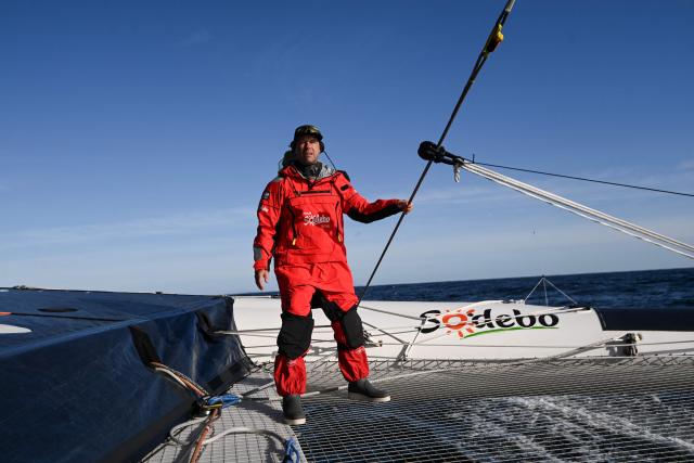 (FILES) French skipper Thomas Coville, member of the Sodebo team, sails the Sodebo Ultim 3 multihull during a training session before an attempt to win the Jules Verne trophy, off Lorient, Western France on November 22, 2024. Navigator Thomas Coville and his crew, on Sodebo Ultim 3, crossed the equator on december 19, 2025 night, four days, four hours and two minutes after their departure around the world off Ushant, setting a new impressive record on this stretch. (Photo by Sebastien Salom-Gomis / AFP)